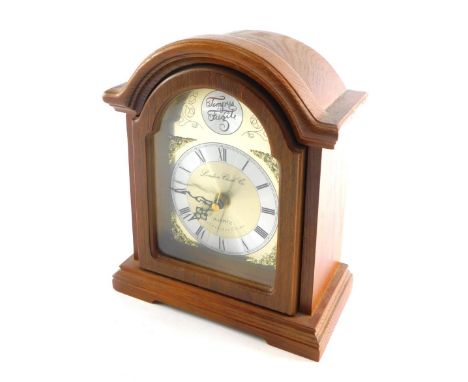 A 20thC London Clock Co Tempus Fugit quartz mantel clock, with raised spandrels, 12cm diameter Roman numeric chapter ring and