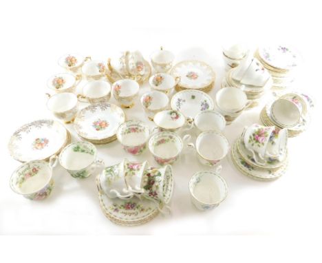 A Royal China part tea service, florally decorated and transfer printed with gilt highlights, to include saucers, 16cm diamet