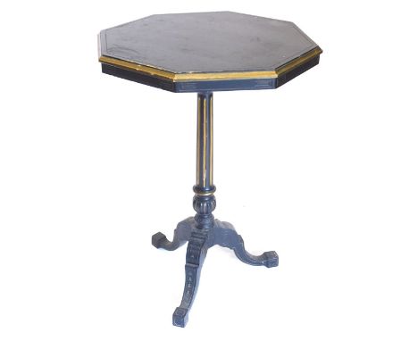 A Victorian ebonised and parcel gilt occasional table, the octagonal top on a part fluted turned column and tripod base, 70cm