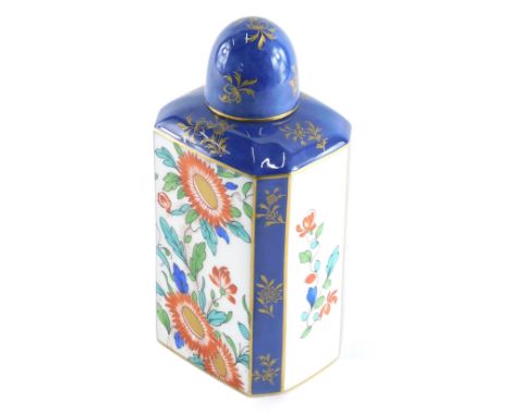 A late 19thC Royal Worcester tea caddy, in blue with panels of flowers with gilt highlights, crescent mark beneath, c. 1896, 