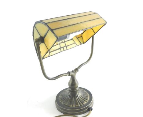 A 20thC Tiffany style desk lamp, cream glass with metal stem, modern electrical feature, 39cm high.