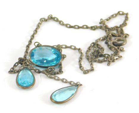 An early 20thC necklace, with central pale blue oval stone with two set drop pendants, on a fancy link white metal chain, sta