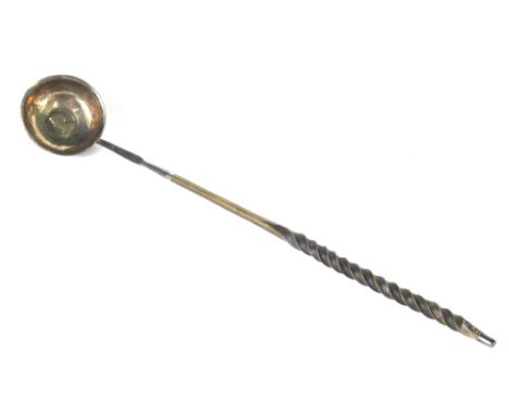 A George III silver toddy ladle, with turned whale bone handle, the plain bowl inset with a Queen Anne coin, possibly a half 