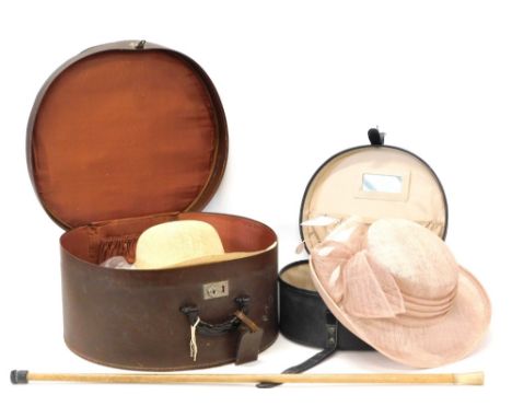 A horn handle walking stick, 88cm long and two hat boxes and hats. (a quantity)