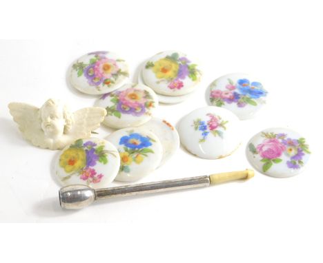 A group of trinkets, comprising painted floral ceramic buttons, an alabaster cherub brooch, a silver plated and bone handle c