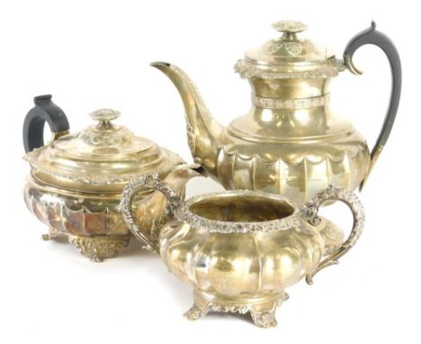 A George IV harlequin silver three piece coffee service, comprising coffee pot, teapot and two handled sugar bowl, each with 