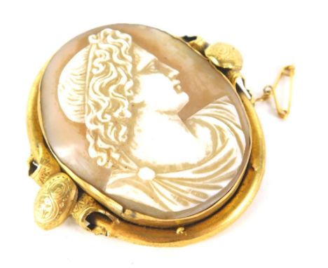 A cameo portrait brooch, classical figure, quarter profile, facing sinister, in elaborate setting with plain pin back, 5cm hi