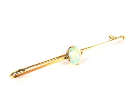 An opal bar brooch, the oval opal in a four claw setting, on a single bar, yellow metal stamped 15ct, 5.5cm wide, 2.4g all in