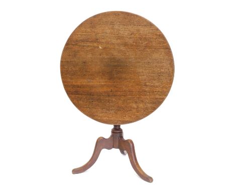 A 19thC oak occasional table, the circular tilt top, on a turned column, on tripod base, 87cm diameter. 