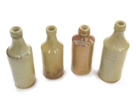 A 19thC stoneware bottle, impressed G. E. Fancourt Stamford, 18cm high, another bottle E. Elger Port Dealer Louth, R Dawber L