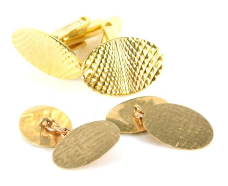 A pair of 9ct gold cufflinks, each with oval ends and chain centres, initialled, 4.5cm high, 3.2g, and a pair of gold plated 