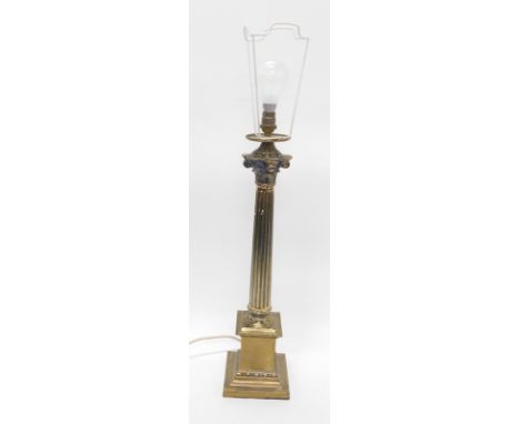 A brass Corinthian column table lamp, with modern electric feature, 75cm high.