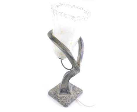 A decorative table lamp, with shaped shade and tree stem, on square base, with modern electrical feature, 57cm high. 