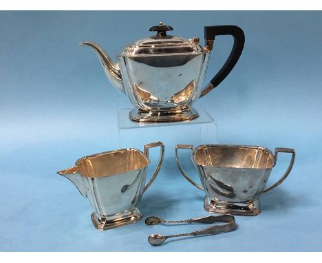 A silver three piece tea service, Atkin Brothers, Sheffield 1940, together with a pair of sugar nips, 32oz