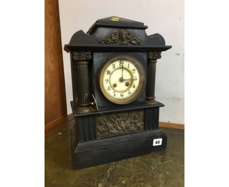 A Victorian slate mantel clock