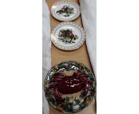 A Palissy style dish decorated with a crab, together with hunting plates