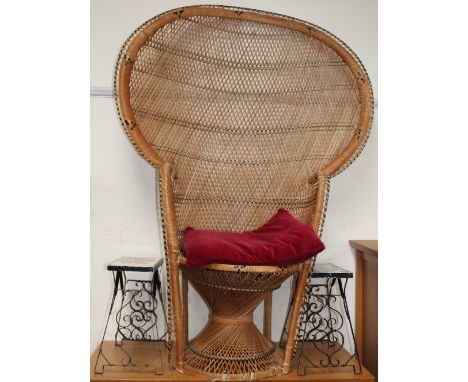 A wicker work peacock type chair together with a pair of tile top side tables