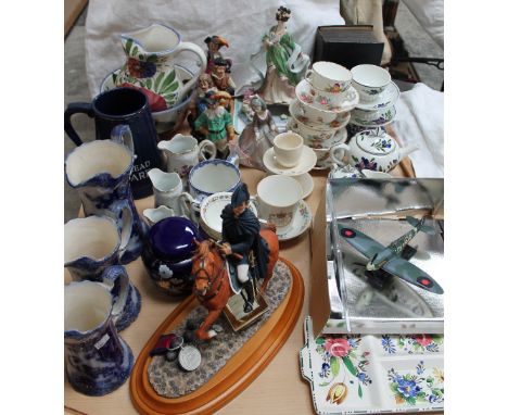 A Whitbread tankard together with graduated pottery jugs, a Royal Mint model of the Duke of Wellington, a Royal Worcester fig