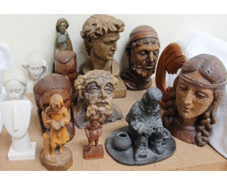 A sculpture of a seated figure by Ezzelina Jones, together with pottery portrait busts, Parian portrait busts, carved treen h