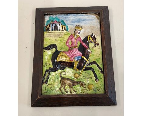Antique polychrome Qajar Persian Islamic ceramic tile depicting a nobleman on horseback in wooden frame tile measres aoorox 2