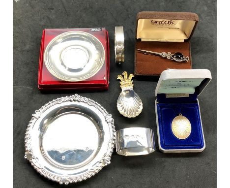 Collection of silver items includes 2 small bowls caddy spoon ,napkin ring Scottish pin brooch etc total weight 280g