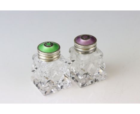 Pair of Norwegian Sterling Silver and Cut Glass Pepperettes, one lid set with Purple Guilloche Enamel and the other with Gree