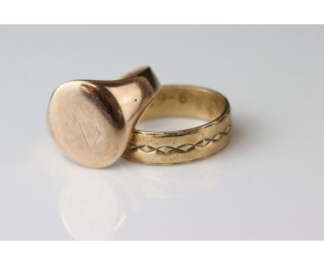 Rose gold signet ring, assessed as 9ct gold, oval panel (possibly with extremely rubbed monogram), ring size N, evidence of r