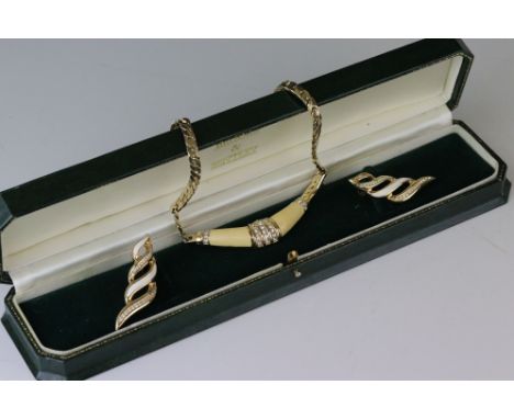 Christian Dior enamel and paste gold plated necklace together with a pair of similar earrings 