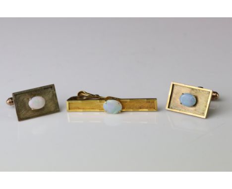 Opal gold plated cufflink and tie clip set, the precious white opals displaying violet, blue, green, yellow and orange play-o