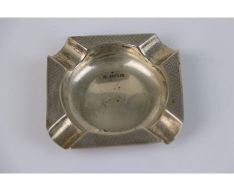 A fully hallmarked sterling silver ashtray with engine turned decoration, maker marked for Charles S Green &amp; Co Ltd, assa