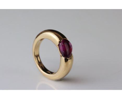 Pomellato tourmaline 18ct yellow gold ring, the cabochon cut asymmetric pink tourmaline measuring approx 7.5mm x 9.5mm, taper
