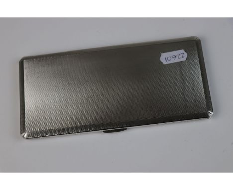 A Art Deco fully hallmarked sterling silver cigarette case with engine turned decoration, Maker marked for E J Trevitt &amp; 