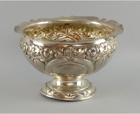 Art Nouveau silver bowl by Henry Atkins  the circular body,  with decoration of flowers with entwined stems, crimped rim, rai