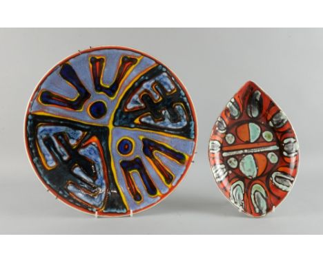 Poole pottery 'Delphis' pattern charger, shape no.5, diameter 36cm together with a 'Delphis' pattern shield shaped plate, sha