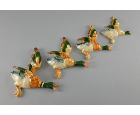 Ceramic flying ducks, for wall mounting, 1930's  the largest 22cm wide