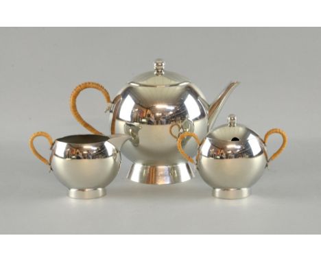 Nick Munro pewter tea service,  spherical tea pot with caned handle  