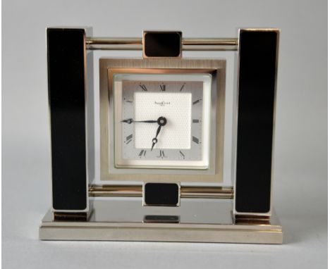 Asprey-Garrard  Art Deco style clock, with black enamel on silvered metal, marked Swiss made, 11 x 12.5 cm 