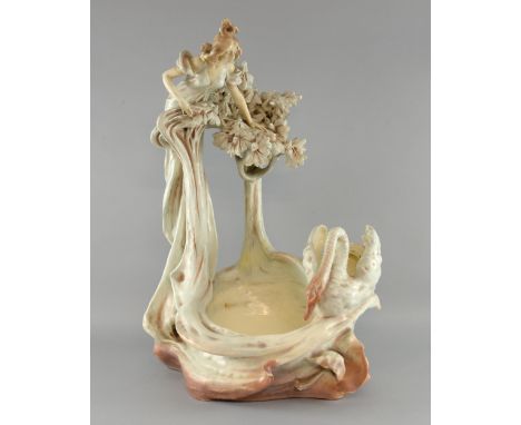 Large Austrian ceramic group, modelled as a young maiden and a swan amongst naturalistic foliage, impressed 5197 W, to unders
