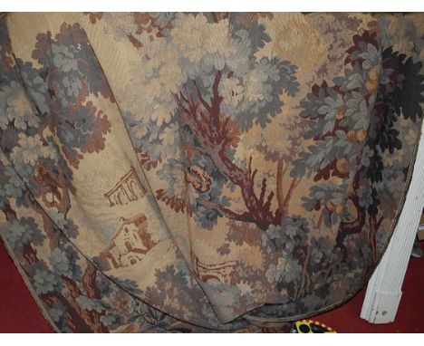 A Continental embroidered tapestry wall hanging, depicting buildings within a landscape with iron hanging pole, together with