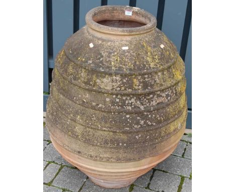 A large garden terracotta olive vase, of ovoid ribbed form, h.85cmCondition report: Some minor chipped losses to rim and body