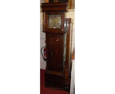 A circa 1800 provincial oak longcase clock, the silvered 10½" dial signed Joseph Nixon, within gilt brass spandrels, with eig