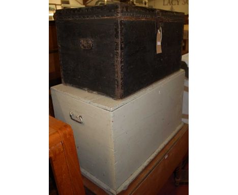 A canvas clad and studded hinge topped travelling trunk, w.76cm; together with a painted hinge topped tool chest, w.87cm (2) 