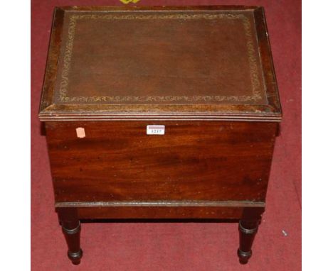 A 19th century mahogany hinge topped commode (lacking interior), on turned supports, w.42.5cm