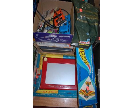 A box containing Dinky Toys taxi, Corgi VW breakdown truck, various plastic models, boxed music maker, boxed Etch-a-Sketch, e