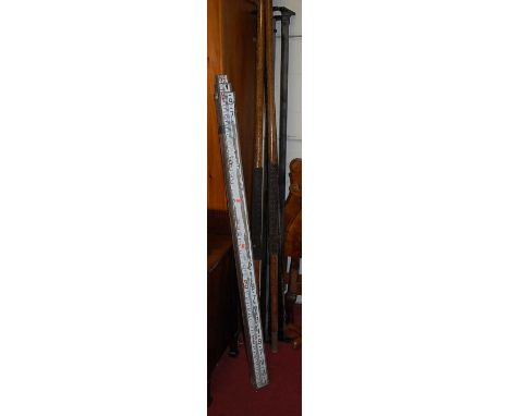 A mid-20th century three drawer measuring stick (with heavy losses to paint)