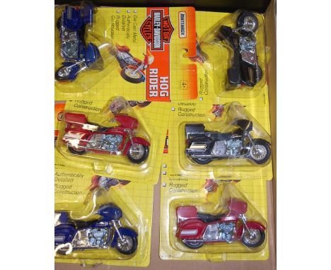 A box containing six Matchbox Harley Davidson Hog Rider Motorcycles