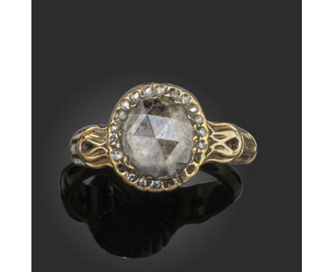 An 18th century diamond cluster ring, the oval shaped rose-cut diamond is set within a surround of smaller diamonds in gold, 