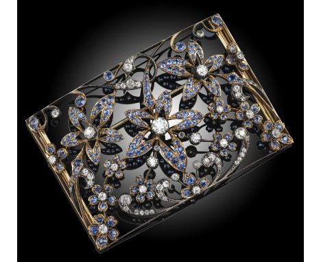 A late 19th century sapphire and diamond buckle, later converted to a brooch, of foliate design, each flower set with a centr