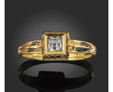 A rock crystal, gold and enamel ring, late 17th century, set with a table-cut rock crystal within a square collet setting acc