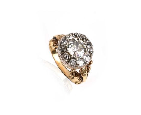 An early 19th century diamond cluster ring, set with a cushion-shaped diamond within a surround of old cushion-shaped diamond
